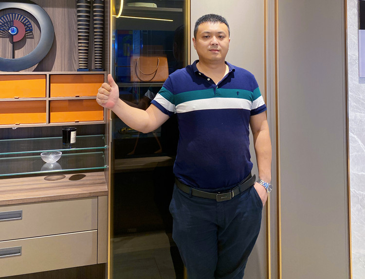谭建明:从“打工仔”到“创业成功者”的蜕变